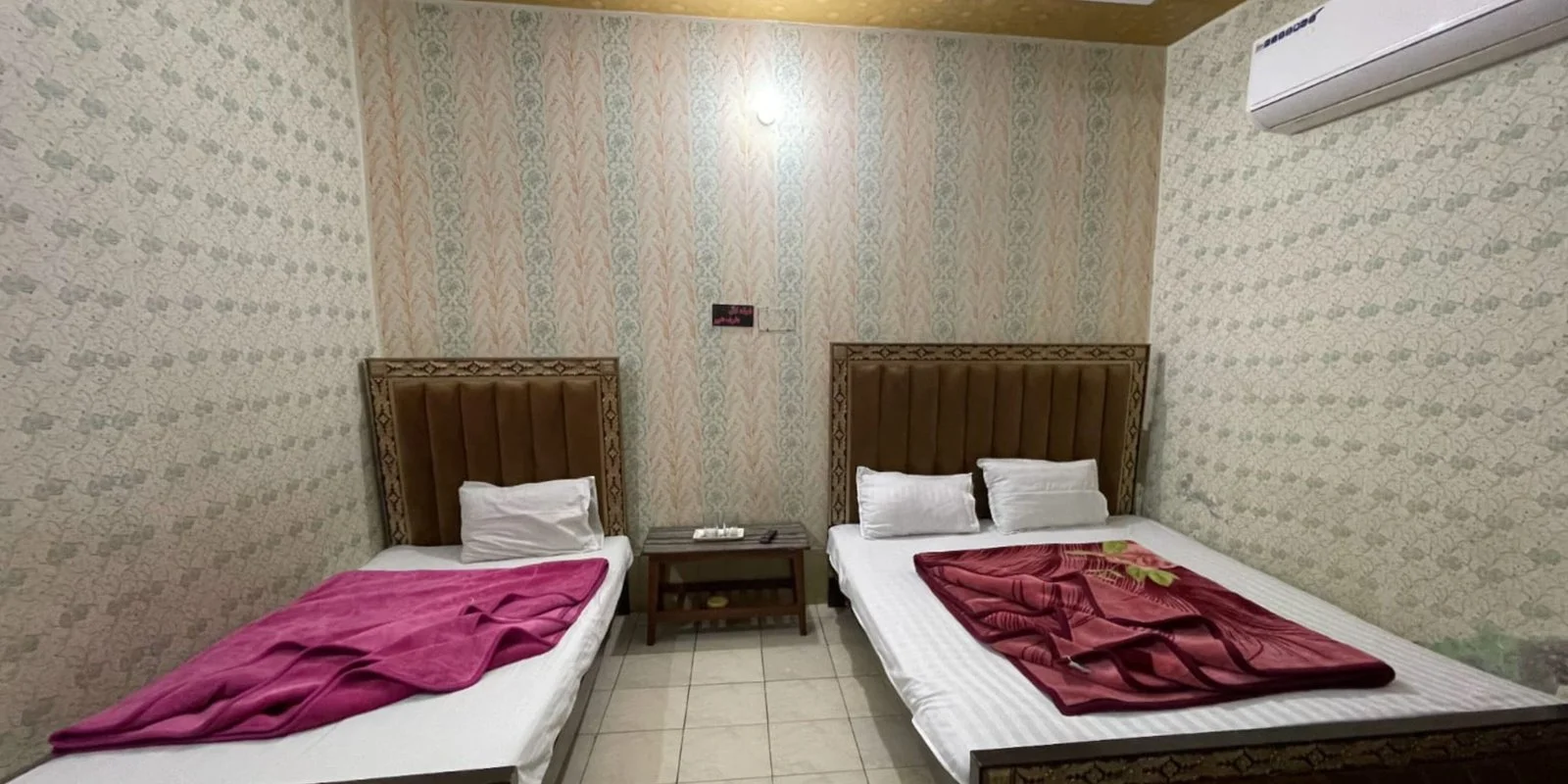 Comfortable room interior at Al Haider Hotel